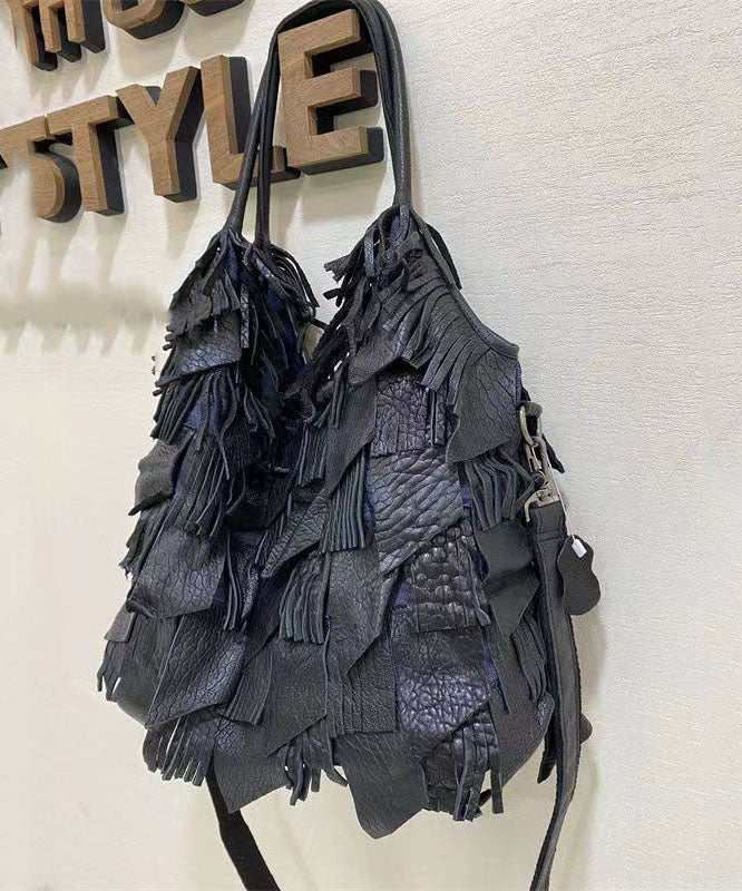 Damens elegant fårskinn crossbody-veske med frynser og indre lommer