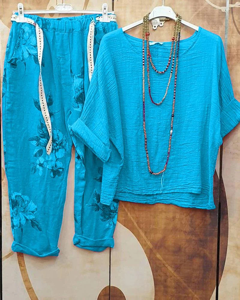 Dam Blus med Blommigt Tryck och Praktisk Ficka