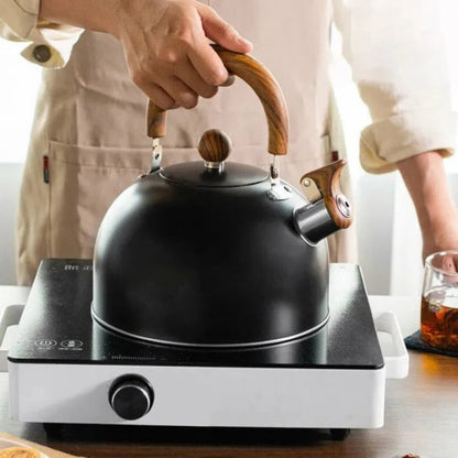 Visslande Kanna med Handtag