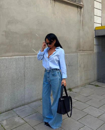 Elegant dameskinnveske med justerbar rem og fire rom